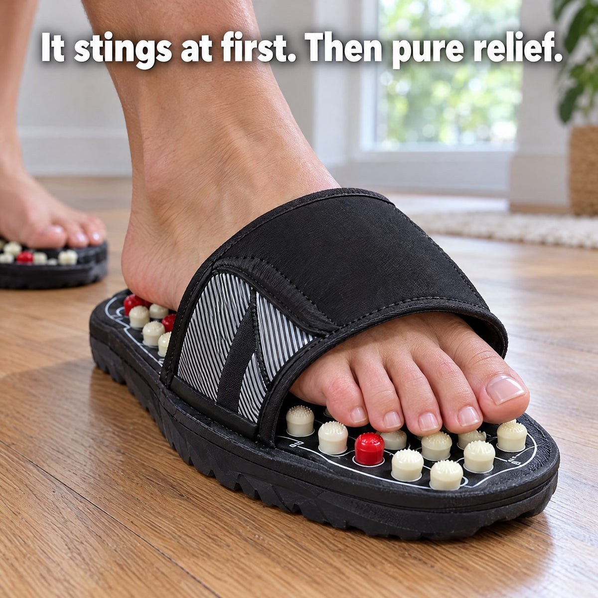 Foot stepping into a Plantra acupressure slipper